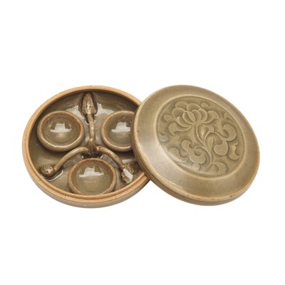 Lot 255 - A Chinese Yaozhou-style celadon box and cover, 20th century