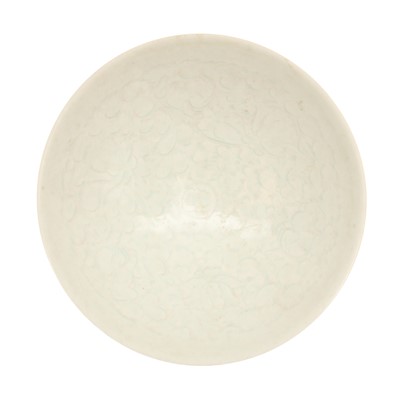 Lot 258 - A Chinese qingbai incised 'phoenix and blossoms' bowl, 20th century