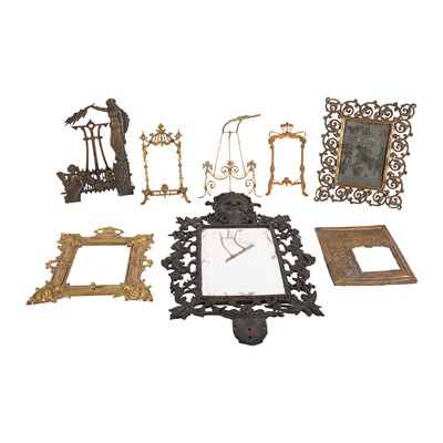 Lot 424 - A Victorian cast iron wall mirror