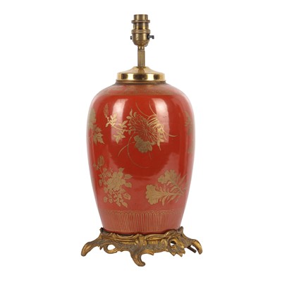 Lot 54 - A Chinese coral-glazed gilt-bronze-mounted jar, late Qing dynasty
