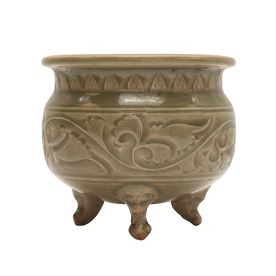 Lot 253 - A Chinese Yaozhou celadon-glazed tripod censer, Song - Jin dynasty