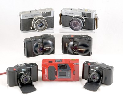 Lot 141 - Two Olympus Trip 35 Cameras. Red flag system working.