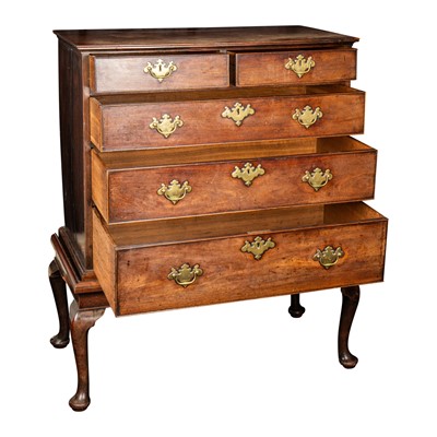 Lot 36 - A George II walnut chest on stand