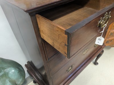 Lot 36 - A George II walnut chest on stand