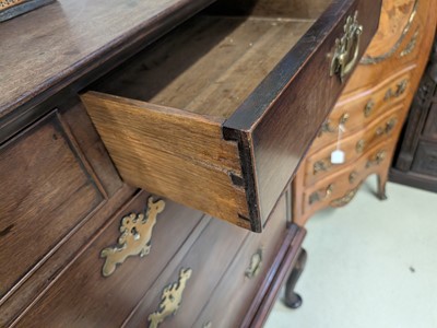Lot 36 - A George II walnut chest on stand