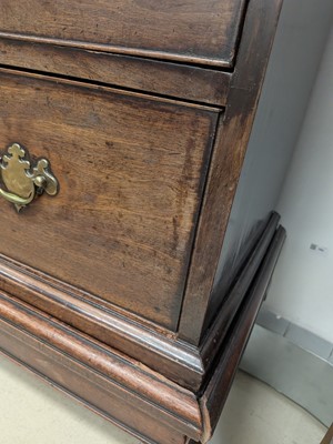 Lot 36 - A George II walnut chest on stand