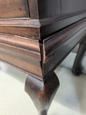 Lot 36 - A George II walnut chest on stand
