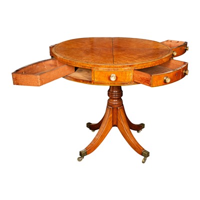 Lot 16 - A George III satinwood and rosewood drum table