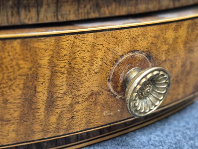 Lot 16 - A George III satinwood and rosewood drum table