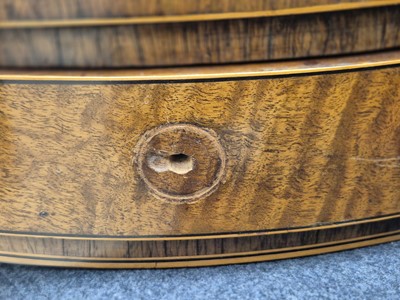 Lot 16 - A George III satinwood and rosewood drum table