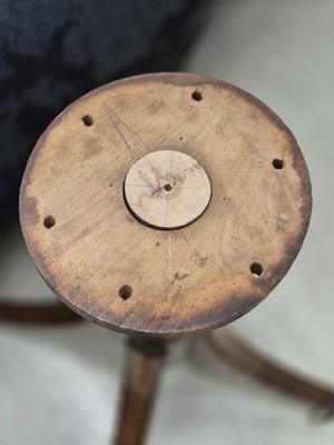 Lot 16 - A George III satinwood and rosewood drum table