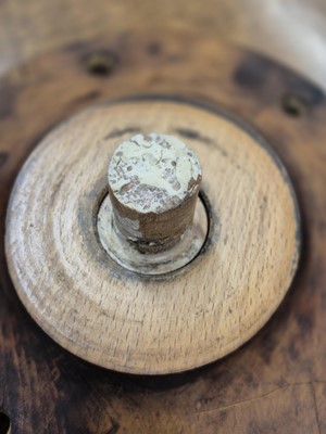 Lot 16 - A George III satinwood and rosewood drum table