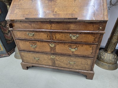 Lot 27 - An early 18th Century George I period walnut feather banded bureau bookcase