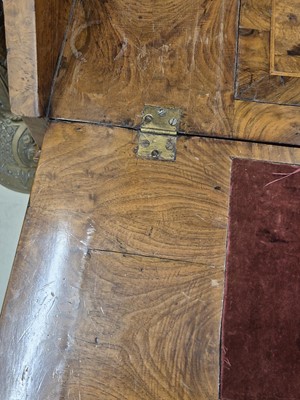 Lot 27 - An early 18th Century George I period walnut feather banded bureau bookcase