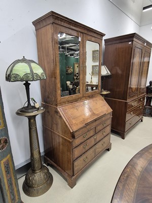 Lot 27 - An early 18th Century George I period walnut feather banded bureau bookcase