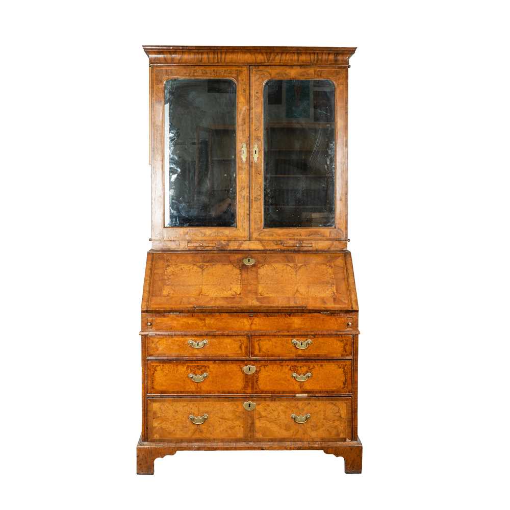 Lot 27 - An early 18th Century George I period walnut feather banded bureau bookcase