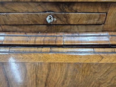 Lot 27 - An early 18th Century George I period walnut feather banded bureau bookcase