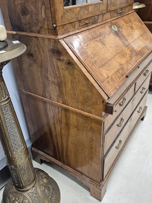 Lot 27 - An early 18th Century George I period walnut feather banded bureau bookcase
