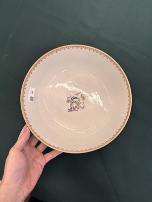 Lot 62 - A Chinese famille-rose 'figurative' punch bowl, Qing dynasty, Yongzheng / Qianlong period