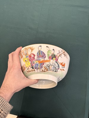 Lot 62 - A Chinese famille-rose 'figurative' punch bowl, Qing dynasty, Yongzheng / Qianlong period