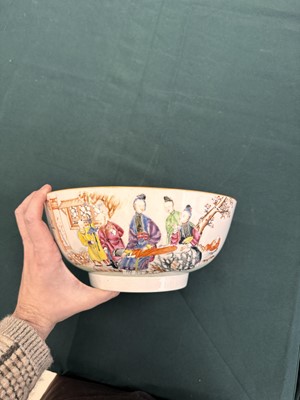 Lot 62 - A Chinese famille-rose 'figurative' punch bowl, Qing dynasty, Yongzheng / Qianlong period