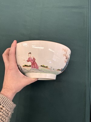 Lot 62 - A Chinese famille-rose 'figurative' punch bowl, Qing dynasty, Yongzheng / Qianlong period