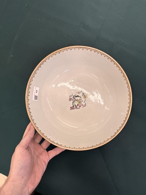 Lot 62 - A Chinese famille-rose 'figurative' punch bowl, Qing dynasty, Yongzheng / Qianlong period
