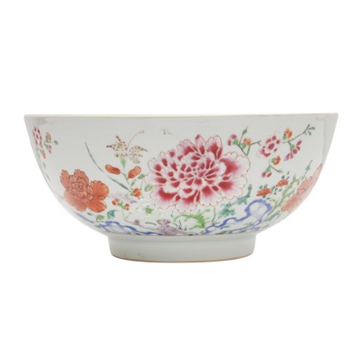 Lot 64 - A Chinese famille-rose 'floral' punch bowl, Qing dynasty, Qianlong period