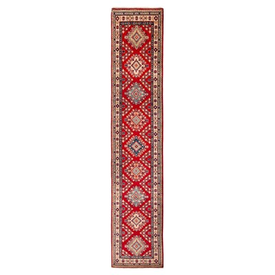 Lot 63 - A fine Kazak design runner