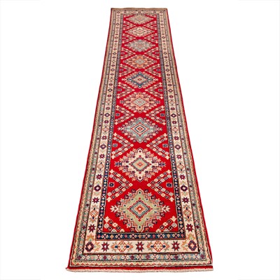 Lot 63 - A fine Kazak design runner