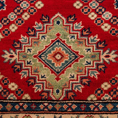 Lot 63 - A fine Kazak design runner