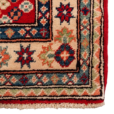 Lot 63 - A fine Kazak design runner