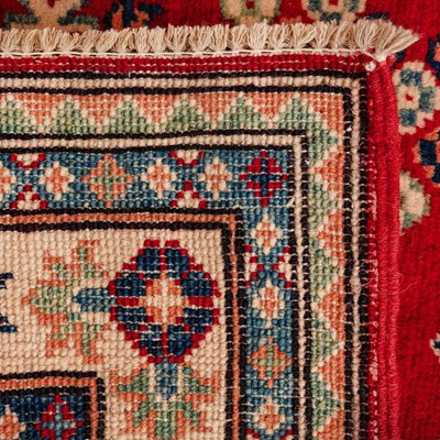 Lot 63 - A fine Kazak design runner