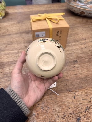 Lot 9 - A Japanese Kyo-Yaki ware tea bowl (chawan), signed Tokusen