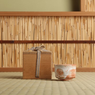 Lot 30 - A Japanese Shino ware sake cup (guinomi), 20th - 21st century