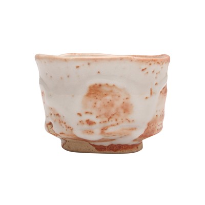 Lot 30 - A Japanese Shino ware sake cup (guinomi), 20th - 21st century