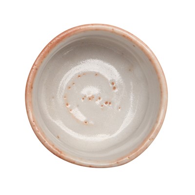 Lot 30 - A Japanese Shino ware sake cup (guinomi), 20th - 21st century