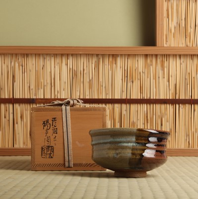 Lot 28 - A Japanese Zezeyaki kutsugata tea bowl (chawan), Showa or later