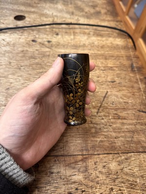 Lot 10 - A fine Japanese lacquered black persimmon wood whisk holder, Edo period - Meiji era, 19th century