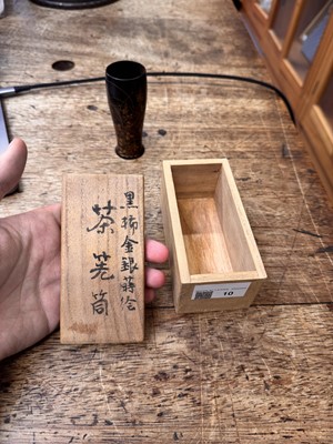 Lot 10 - A fine Japanese lacquered black persimmon wood whisk holder, Edo period - Meiji era, 19th century