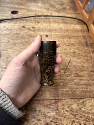 Lot 10 - A fine Japanese lacquered black persimmon wood whisk holder, Edo period - Meiji era, 19th century