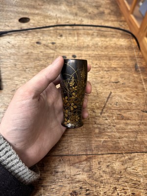 Lot 10 - A fine Japanese lacquered black persimmon wood whisk holder, Edo period - Meiji era, 19th century