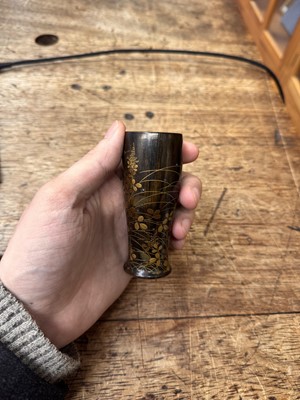 Lot 10 - A fine Japanese lacquered black persimmon wood whisk holder, Edo period - Meiji era, 19th century