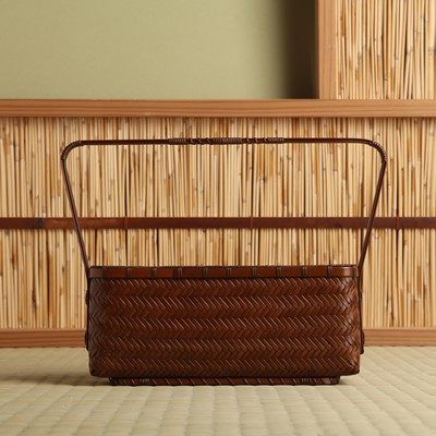 Lot 8 - A Japanese bamboo Ikebana basket, 20th century