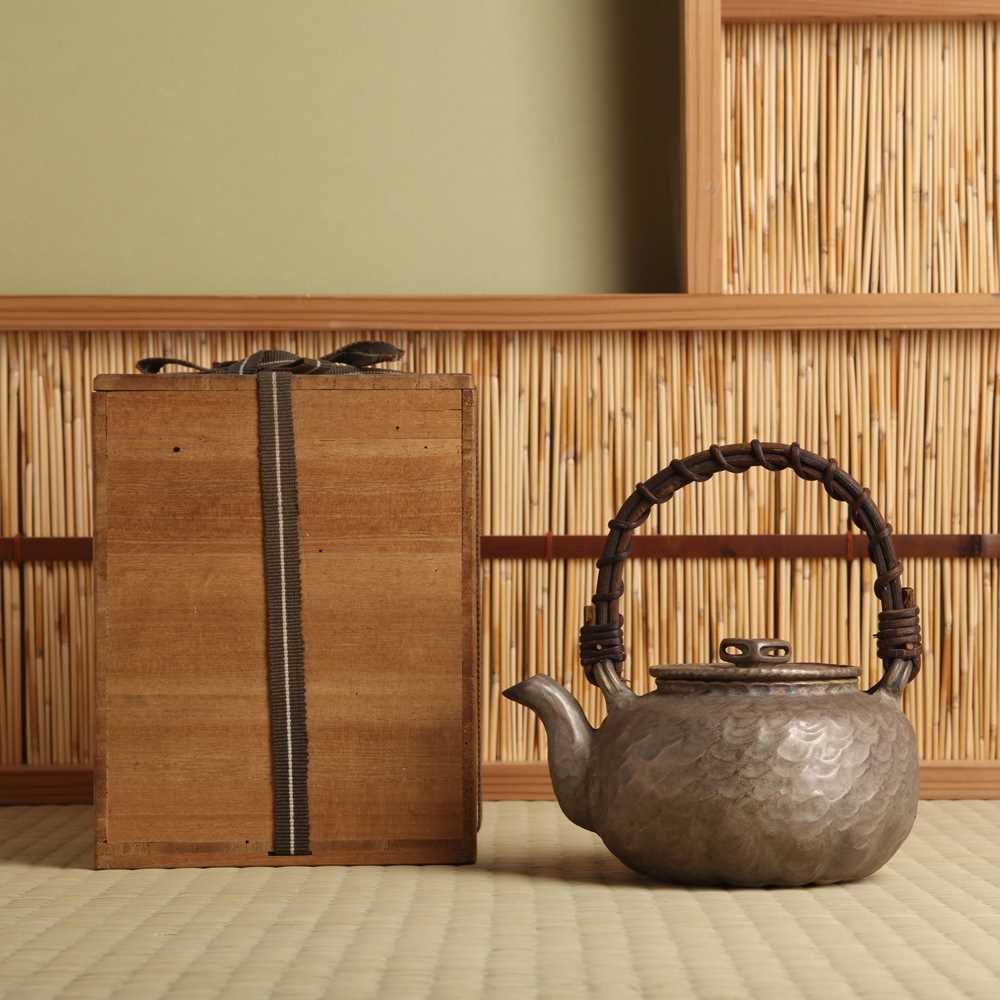 Lot 14 - A Japanese Banko ware silver imitation teapot (kyūsu), Meiji-Showa period