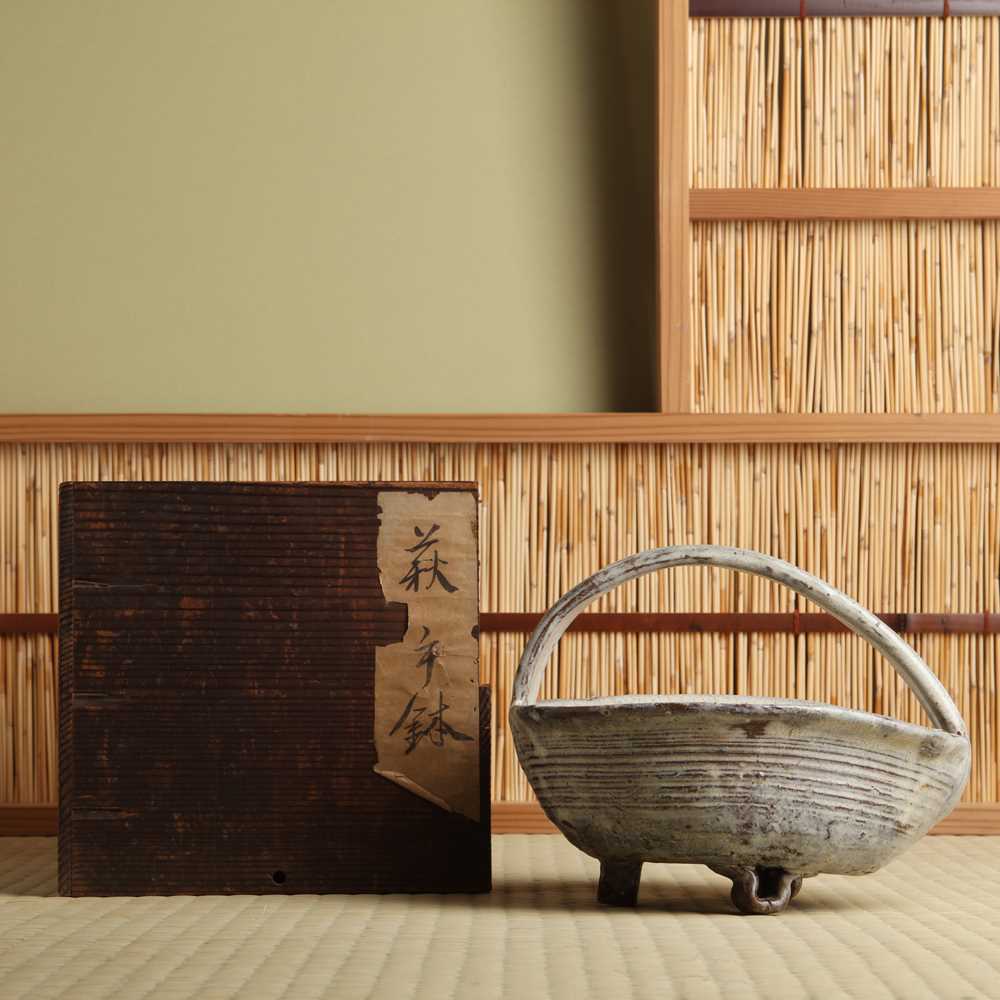 Lot 18 - A Japanese Hagi ware sweets tray (tetsuki kashiki) Edo period