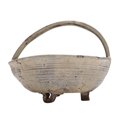 Lot 18 - A Japanese Hagi ware sweets tray (tetsuki kashiki) Edo period