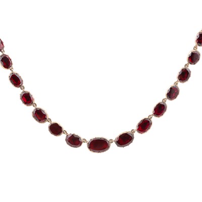 Lot 108 - An early Victorian garnet riviere necklace