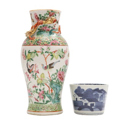 Lot 159 - A Chinese Canton famille-rose vase and a Japanese blue and white cup, 19th century