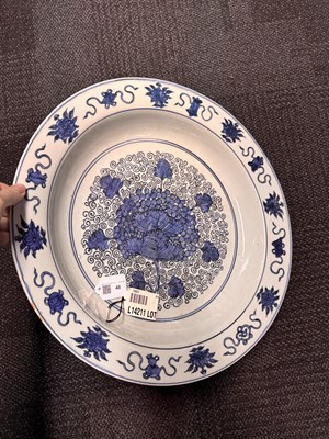 Lot 46 - A large Chinese blue and white ‘grape’ charger dish, Ming dynasty, Jiajing period